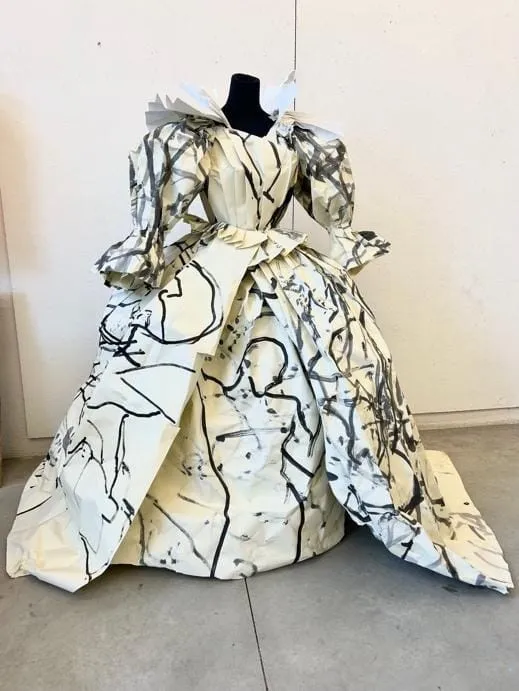 A mannequin wearing a dress Description automatically generated