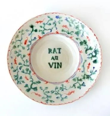 A plate with a design on it Description automatically generated