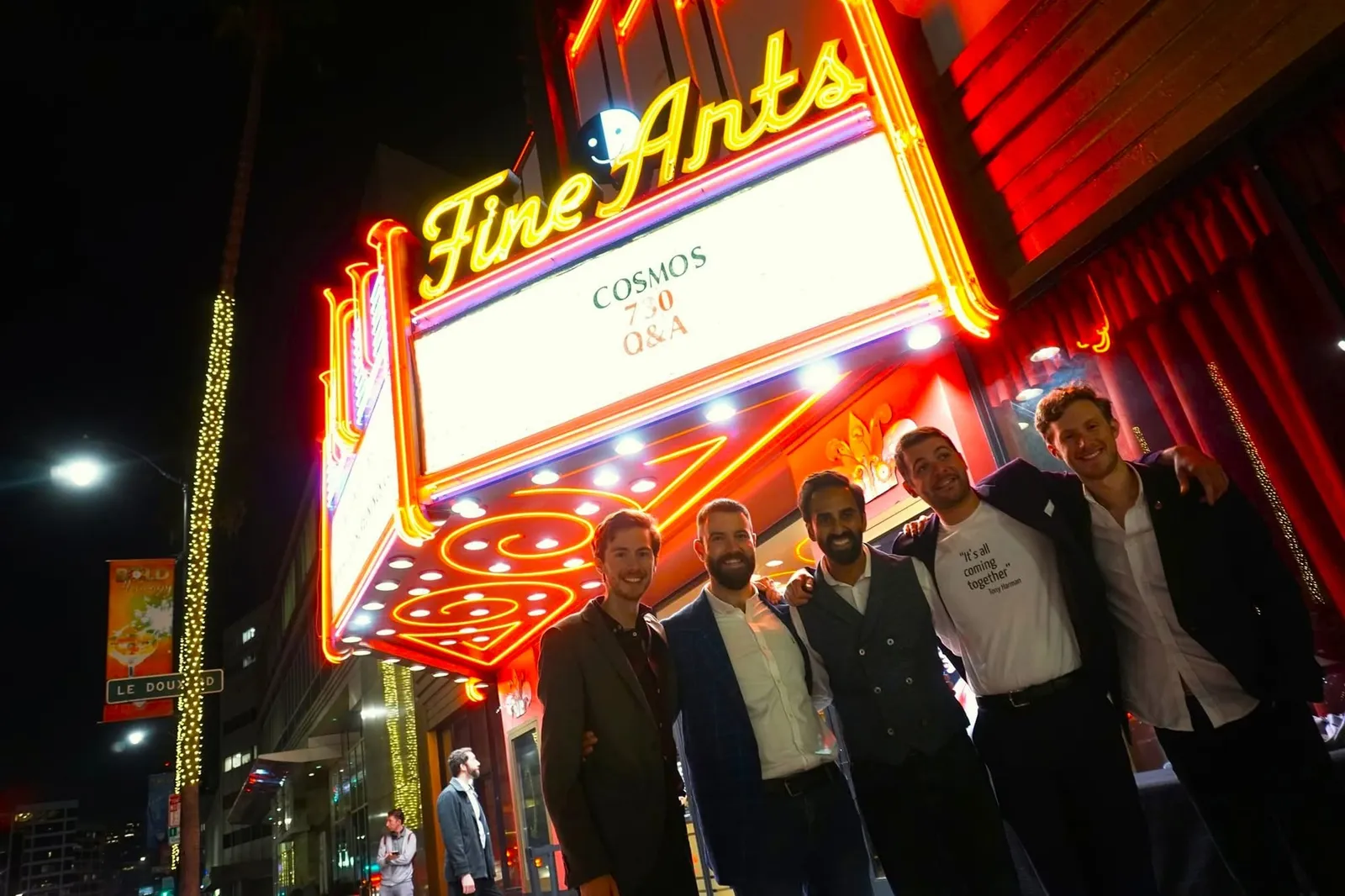 Elliot and Zander Weaver with members of the Cosmos team outside the Fine Arts Theatre at the film’s Los Angeles premiere in 2019.